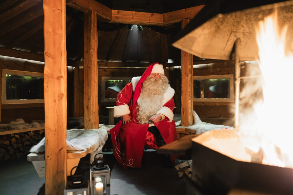 Santa sitting in a hut of LeviTour